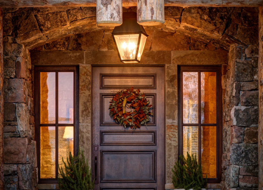 front door and entry of custom home designed by Think Architecture