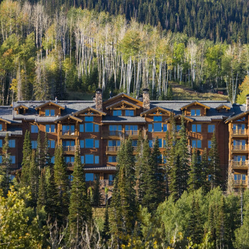 Grand Lodge Hotel & Resort in Utah surrounded by trees & mountains